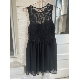 Francesca’s high neck lace and sequin dress